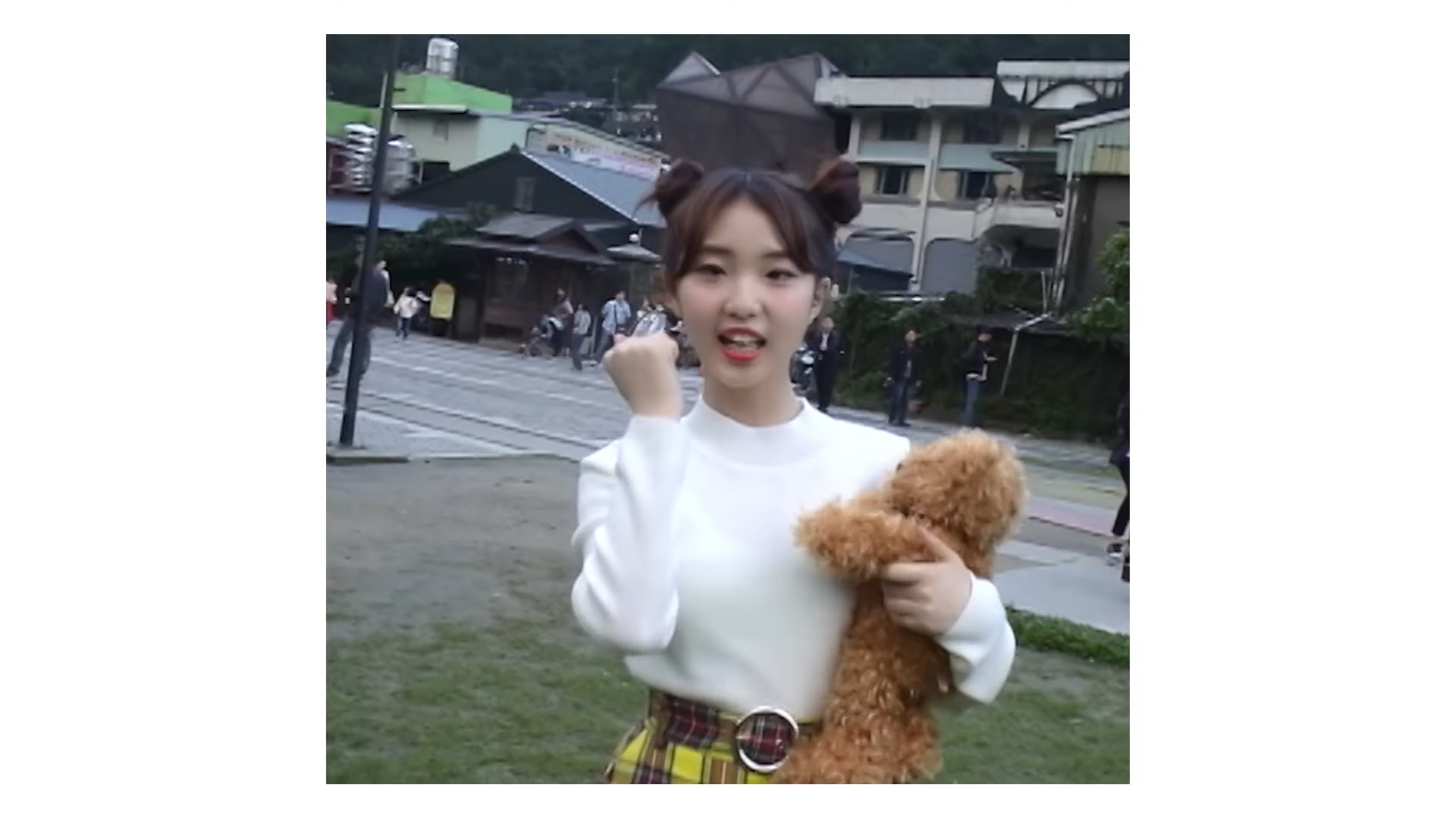 Yeojin holding the teddy bear.
